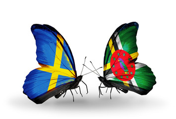 Two butterflies with flags Sweden and Dominica