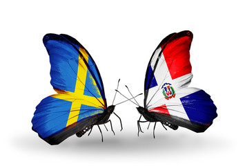 Two butterflies with flags Sweden and Dominicana