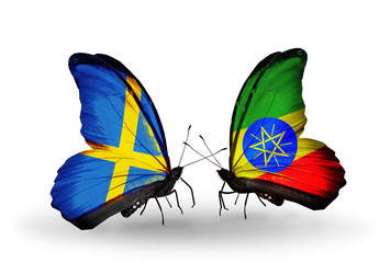 Two butterflies with flags Sweden and Ethiopia