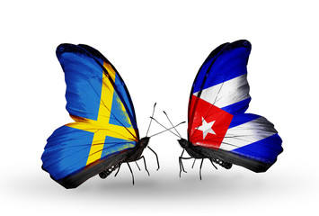 Two butterflies with flags Sweden and Cuba