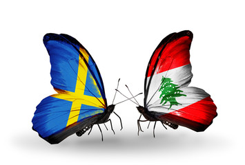 Two butterflies with flags Sweden and Lebanon