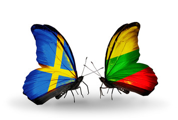 Two butterflies with flags Sweden and Lithuania