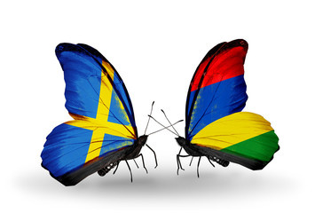 Two butterflies with flags Sweden and Mauritius
