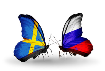 Two butterflies with flags Sweden and Russia