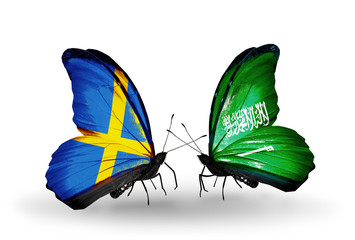 Two butterflies with flags Sweden and Saudi Arabia