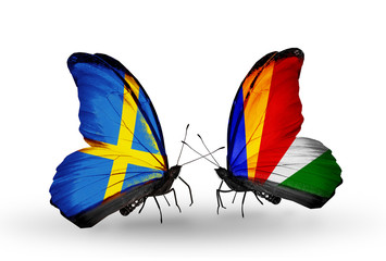 Two butterflies with flags Sweden and  Seychelles