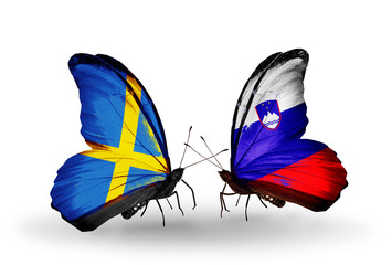 Two butterflies with flags Sweden and Slovenia