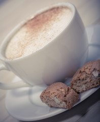 Cup of espresso and biscotti 