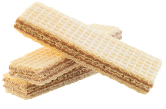 beautiful macro of three hazelnuts wafer