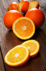 Group of oranges on a wooden table