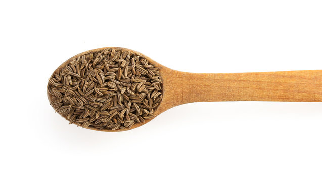 cumin seeds in spoon