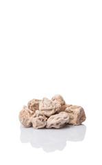 Salted tamarind fruit over white background 