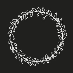 Hand drawn doodle floral frame on the blackboard