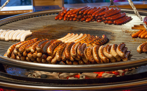 Delicious german sausages on the barbecue grill 