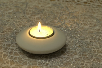 candle in candlestick holder