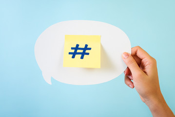 Social media hashtag on blue background