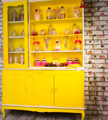 Colorful bright yellow welsh dresser