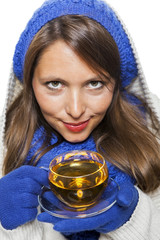 Fashionable young woman in knitted winter ensemble 