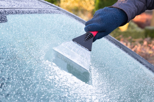 Hand Scratching Ice From Car Window