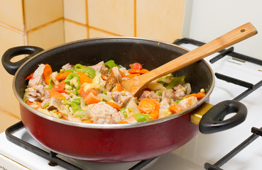 Stew meat in the pan.