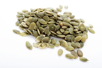dried pumpkin seeds isolated on white