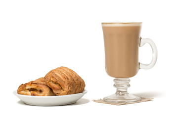 Coffee cup with fresh baked apple pies. Isolated on white
