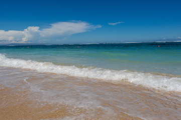 Beautiful tropical beach with lush vegetation