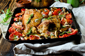 Baked sea bass with vegetables and herbs