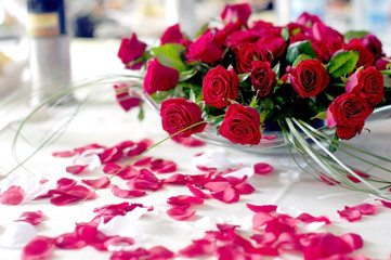 red roses for the bride and groom