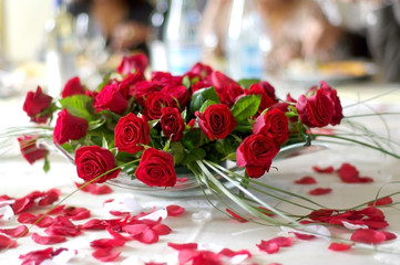red roses for the bride and groom