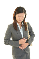 腹痛を訴えるOL