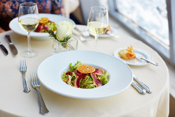 Salad with herbs and smoked duck breast