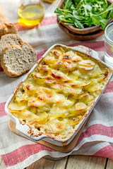 Potato gratin with bacon and cheese