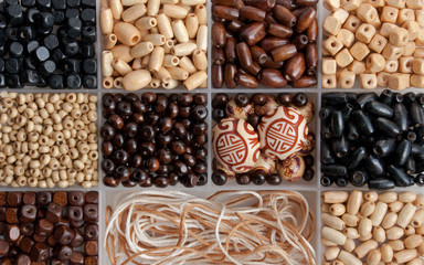 Set of wooden beads and threads 
