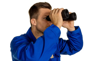 Handwerker mit Fernglas