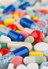 Color pills and capsules background