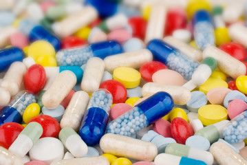 Color pills and capsules background