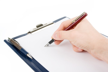 Hand writing on an empty paper in a clipboard isolated on white