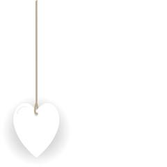 white heart hanging in rope