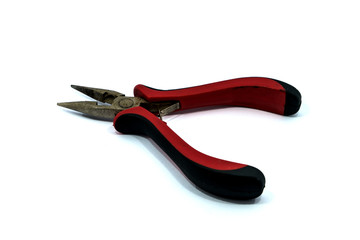 Obraz premium Red and black grip pliers on a white background.