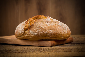 white bread over wooden background