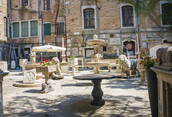 street in historic Venice, Italy with beautiful monument