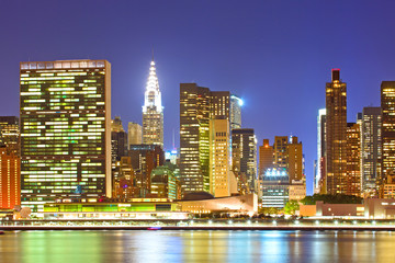 Fototapeta na wymiar New York City, USA buildings in Manhattan at sunset