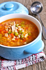 Soup with small pasta, vegetables and pieces of meat