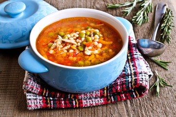 Soup with small pasta, vegetables and pieces of meat
