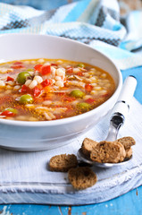Soup with small pasta, vegetables and pieces of meat