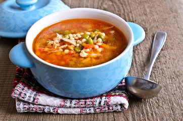 Soup with small pasta, vegetables and pieces of meat
