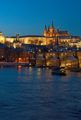 Fototapeta premium Prague Castle with Charles Bridge in the evening,