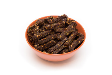 Crackers on bowl isolated on white