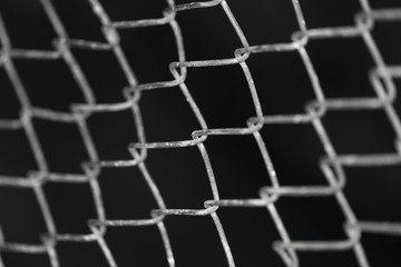 Fototapeta premium metal grid on a black background background
